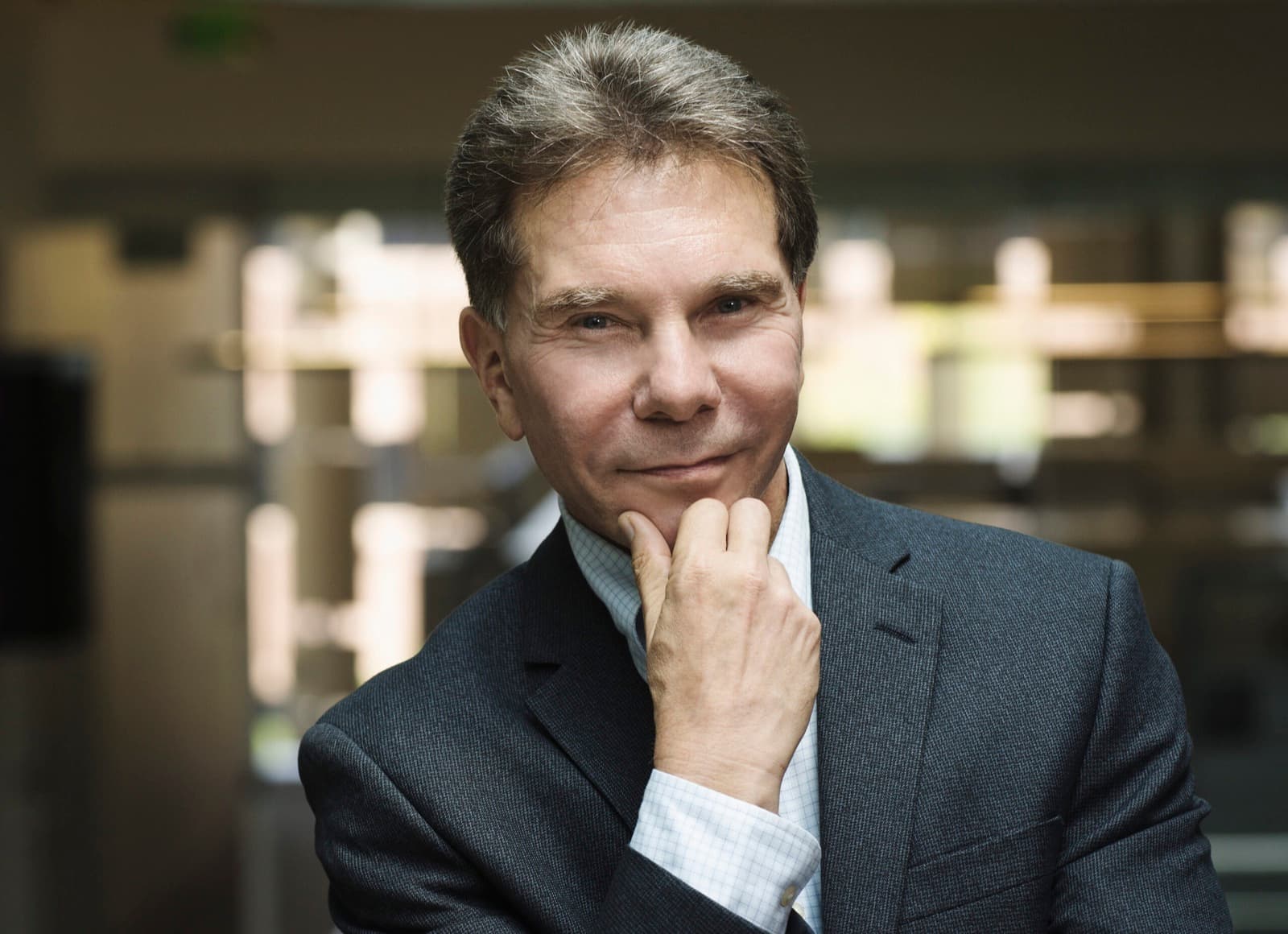 Dr. Robert Cialdini, hand to his chin